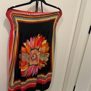 Cute, sundress or swim cover up. Fits like a size large